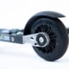 Close-up of FF 360 Flow Skate roller ski featuring Salomon bindings and advanced recyclable black plastic wheels.