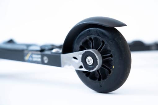 Close-up of FF 360 Flow Skate roller ski featuring Salomon bindings and advanced recyclable black plastic wheels.