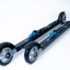 Side view of FF 360 Flow Skate roller skis showcasing aluminum rims and Salomon Race Skate bindings.