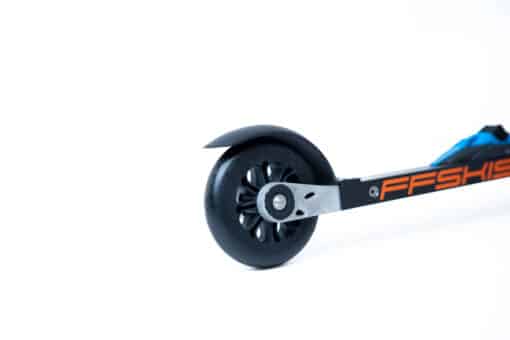 Close-up of FF 360 Flow Skate roller skis with Salomon bindings and 100% recyclable black plastic wheels.