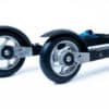 Side view of FF 360 Flow Skate roller skis showcasing aluminum rims and Salomon Race Skate bindings.