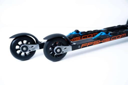 Side view of FF 360 Flow Skate roller skis featuring Salomon bindings and durable black plastic wheels.