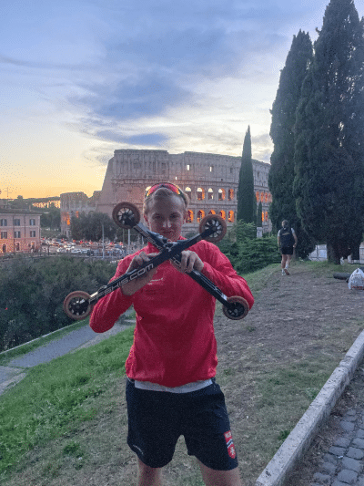 Presenting the ff ambassadour Hermann Botterud displayed showing ff race skis with Colosseum as backdrop