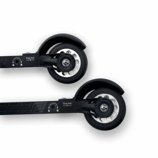 Close-up view of two black Flow link rollerski rear wheels, showing the black rubber tires and silver hubs with adjustable se